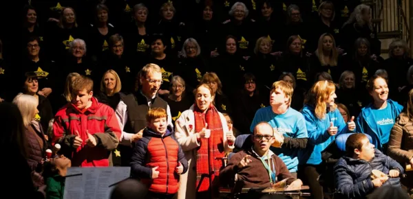 Choir members performing in a group